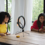 medium-shot-smiley-women-with-technology